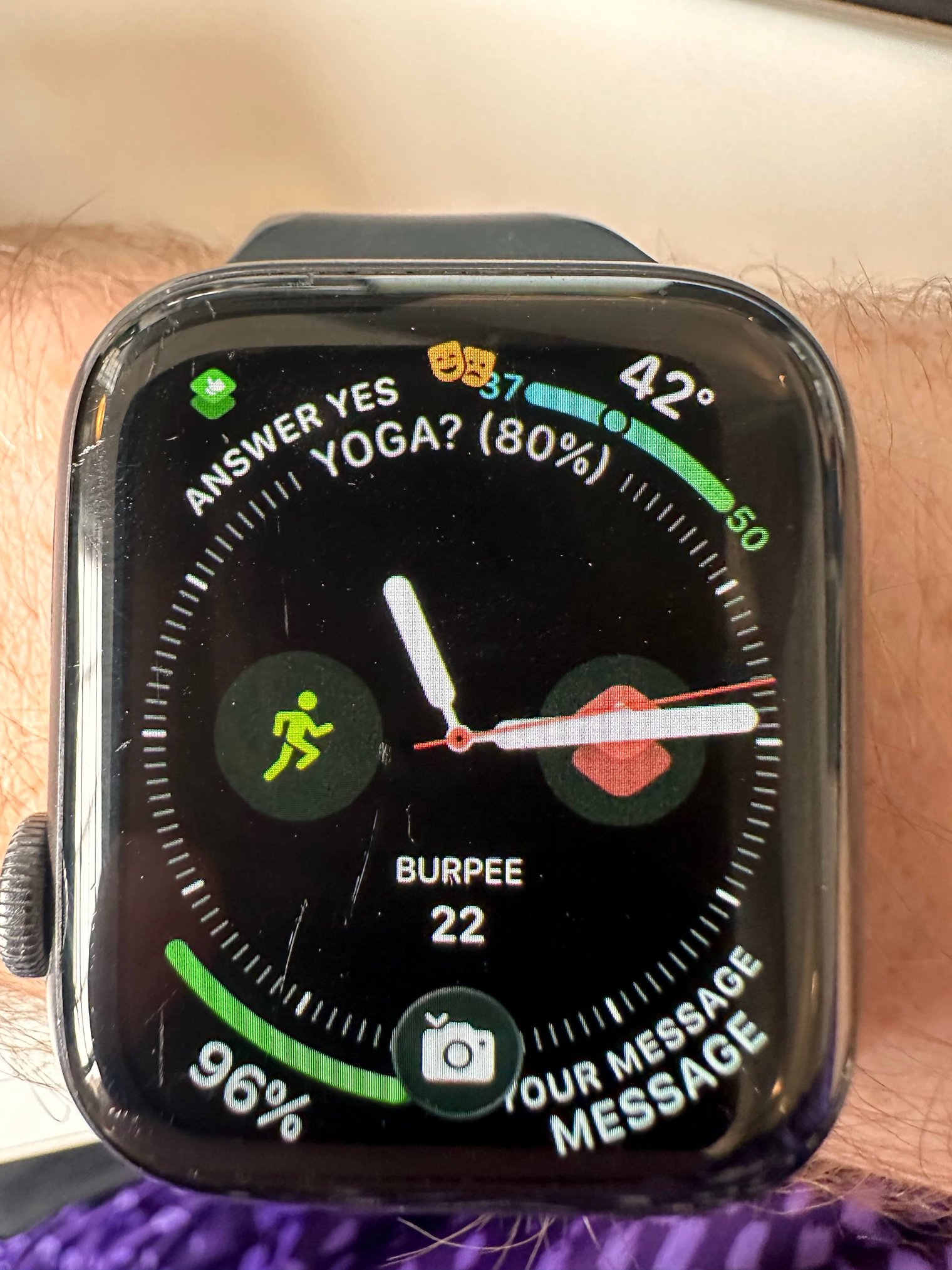 Apple Watch face showing the burpee goal (22) as a complication, alongside a Fatebook prediction "YOGA? (80%)"