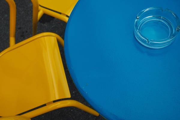 Table near the Rhein. St. Johanns-Rheinweg, Basel, Switzerland, 3:22 PM, Wednesday, 1 May 2024. Fujifilm X100VI, flash off, f/5.6 at 1/220 at Auto ISO 125. Reggie's Portra + Luminar Neo.