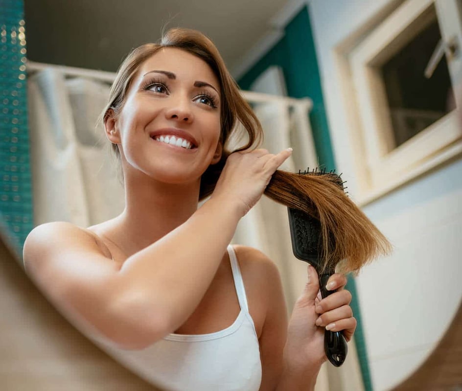 Comb Freely with the Best Shampoo and Conditioner for Tangled Hair. Morning Routine stock photo