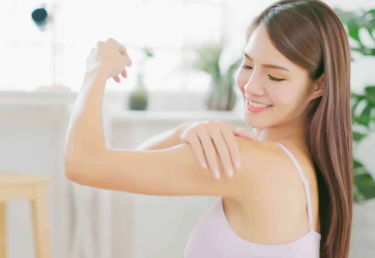 Luxury Skincare Products and Tips for Long-Lasting Hydration. Stock photo of woman moisturizing her skin.