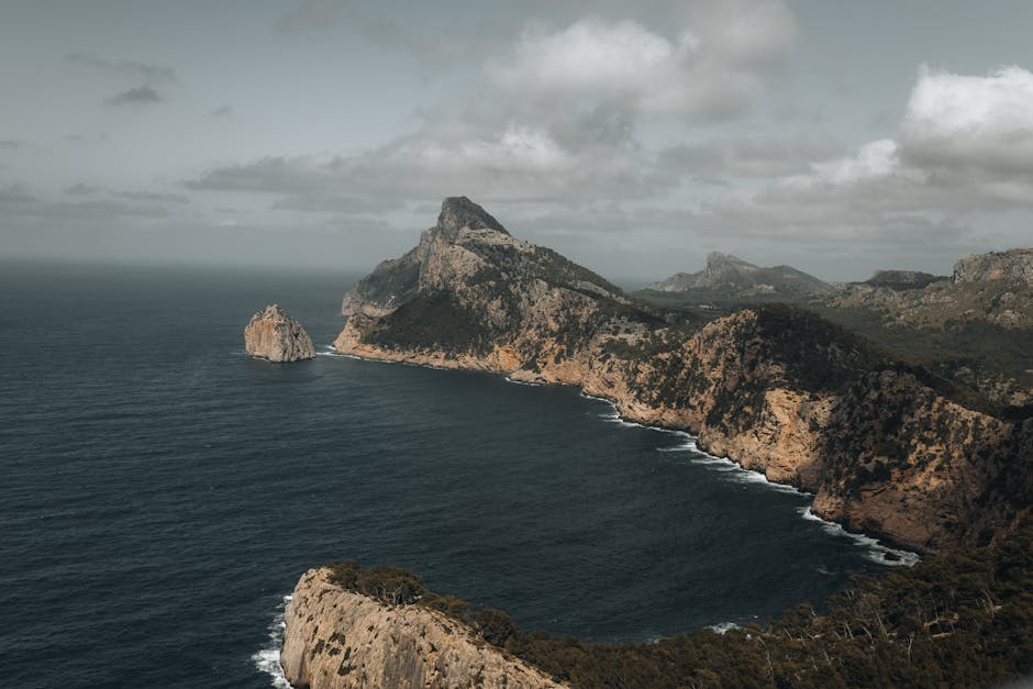 A stunning aerial view of the rugged coastline and cliffs of Cap de Formentor in Mallorca, Spain.