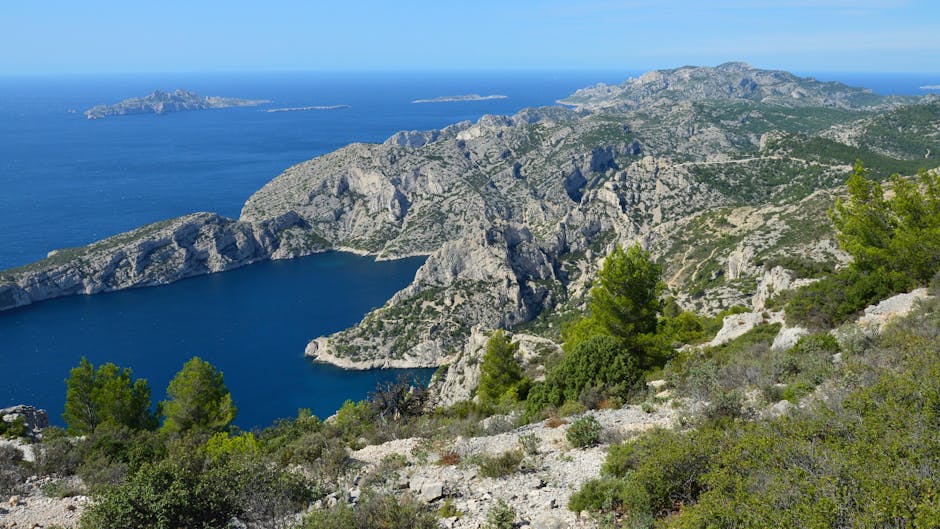 A breathtaking aerial view of the rocky coastline in Calanques National Park, Marseille.