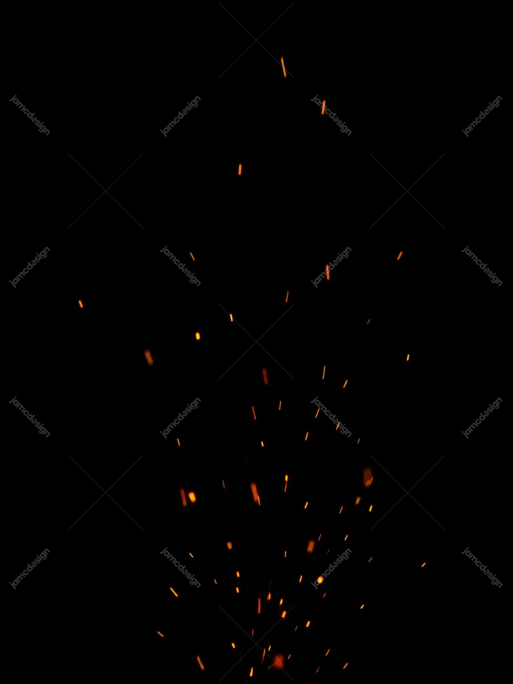 Orange Fire Sparks On Black Background Ember Glow Texture. JPG texture showing scattered orange sparks rising against a deep black background