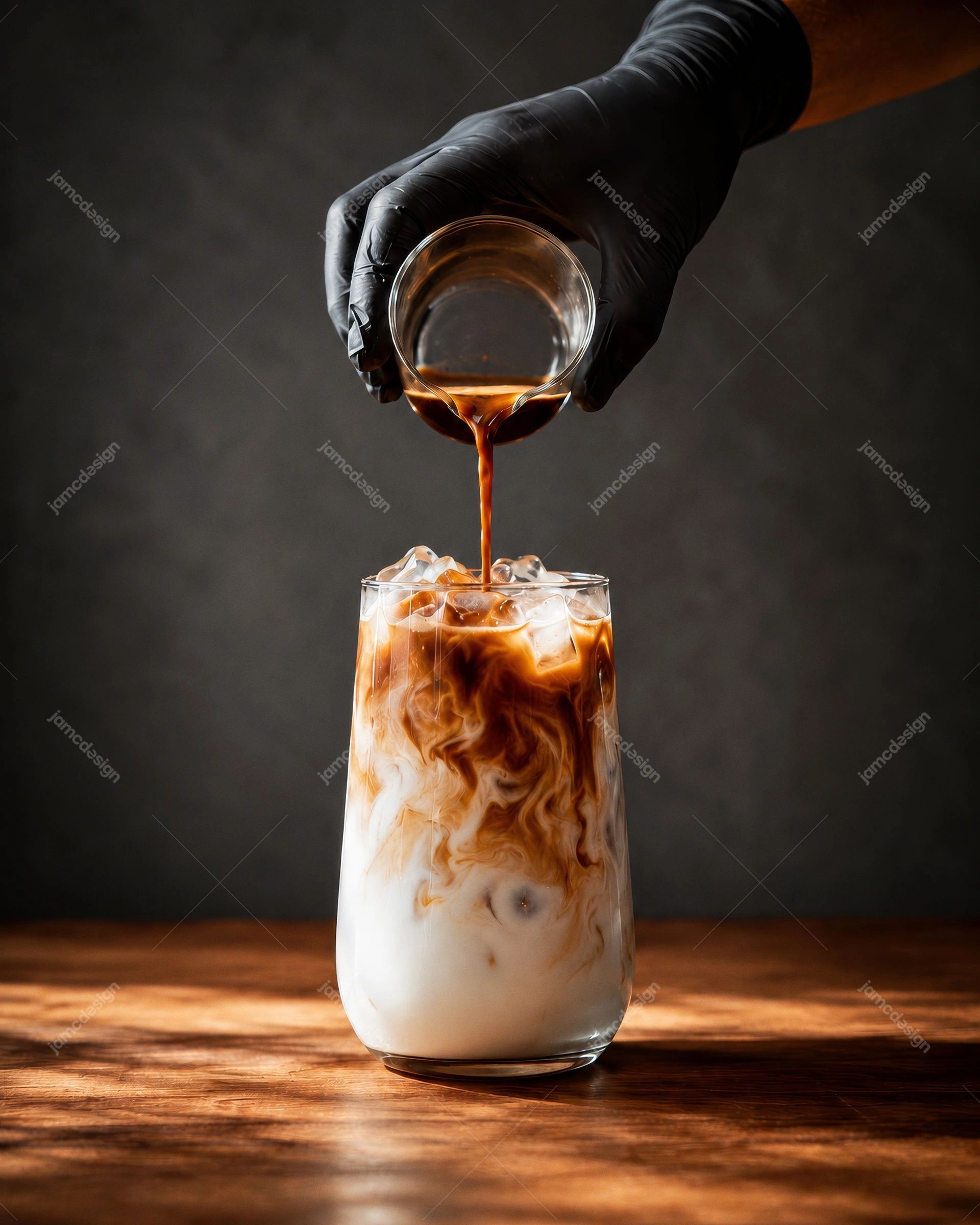 Iced Coffee Pouring into Milk Glass Photography