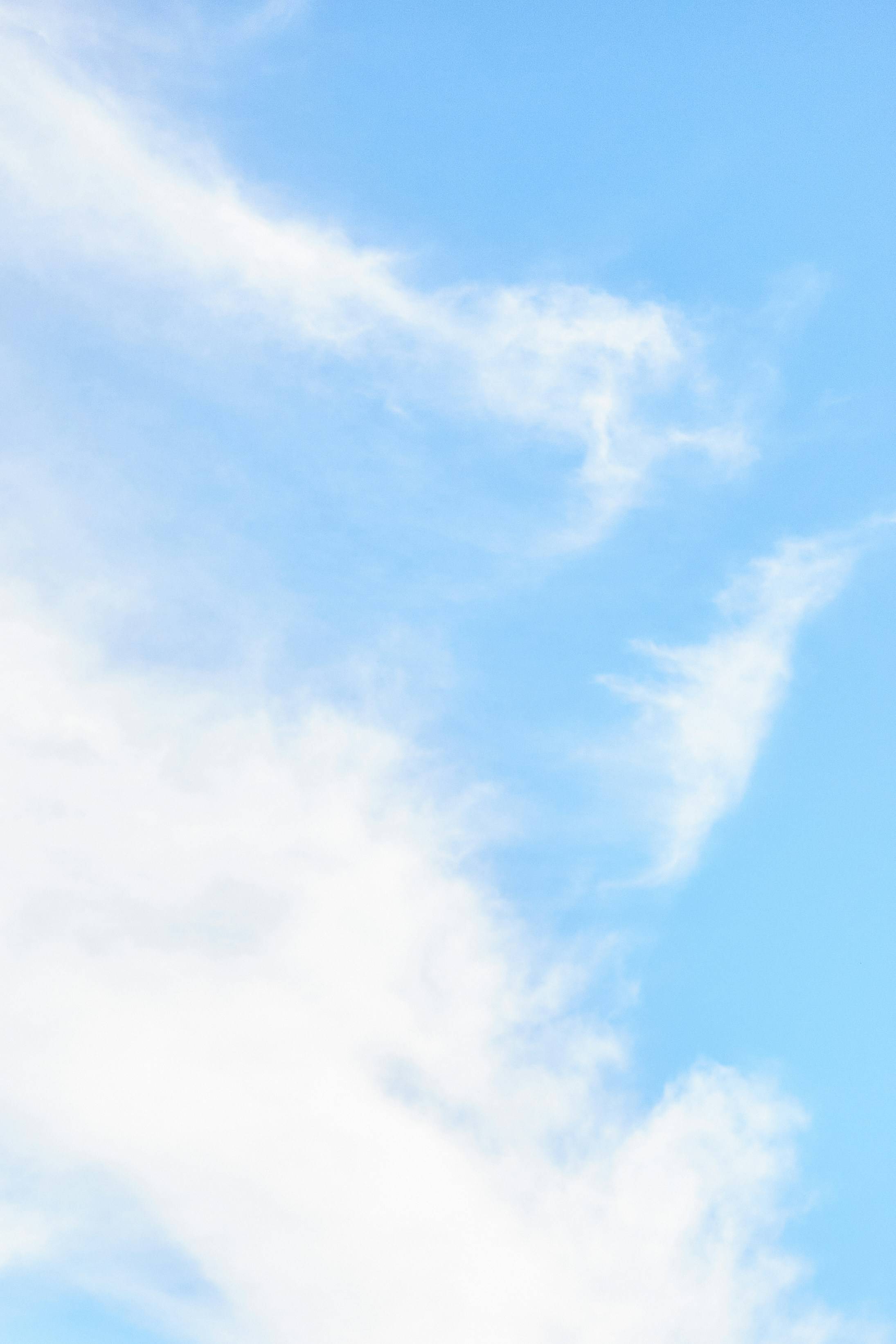 Soft Blue Sky Clouds Background