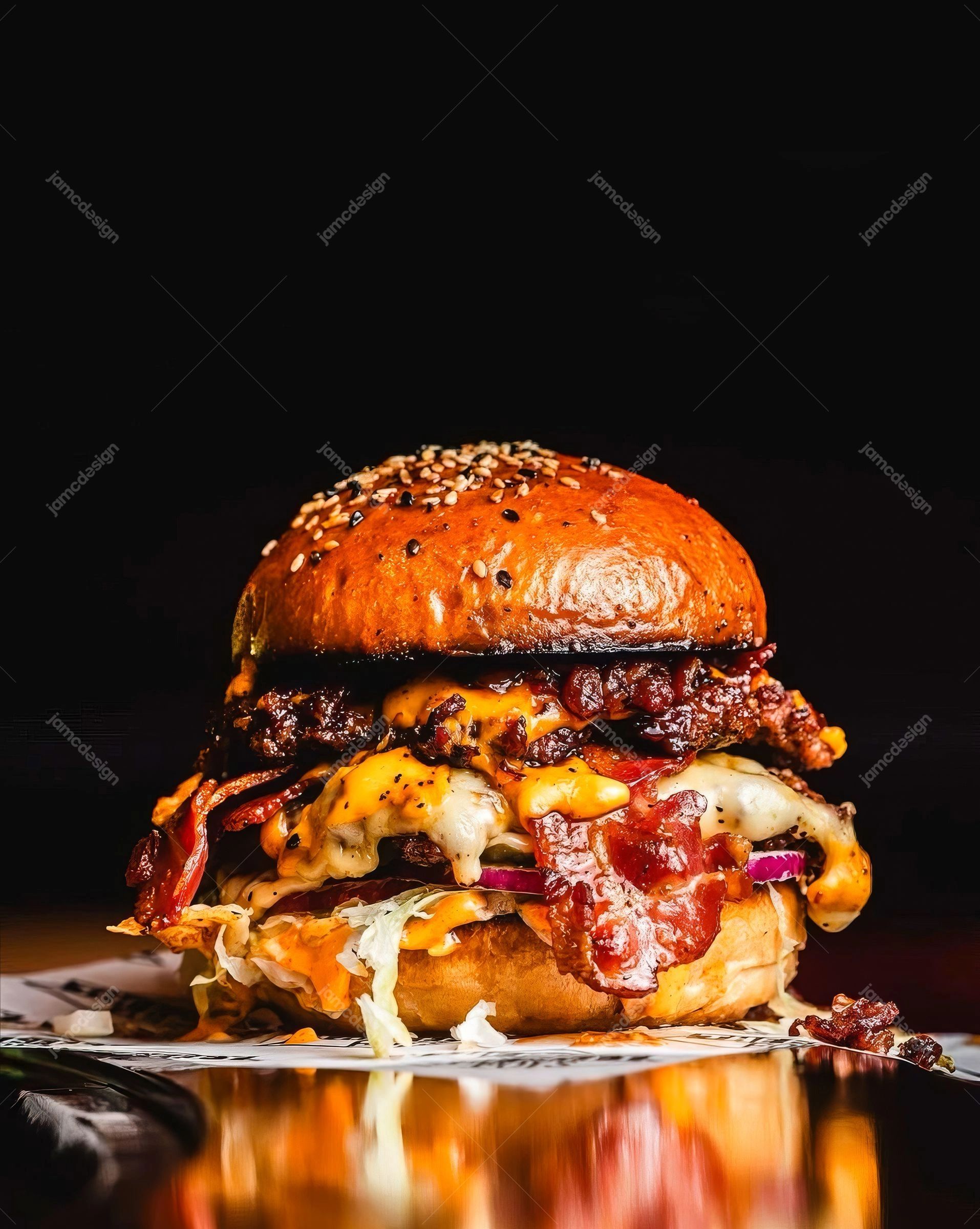 Gourmet Bacon Cheeseburger On Black Background