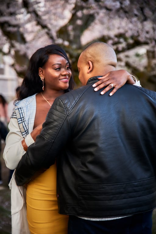 Warm embrace captured beneath a leafy tree canopy