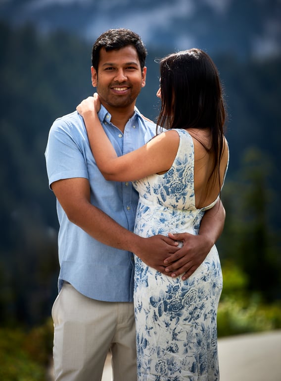 Couple posed together in soft diffused natural outdoor light