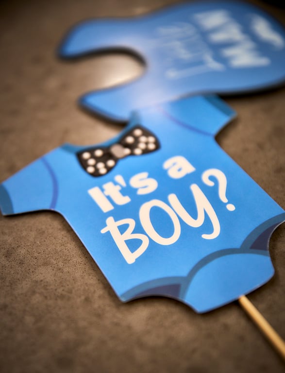 Guest of honor surrounded by loved ones at the baby shower