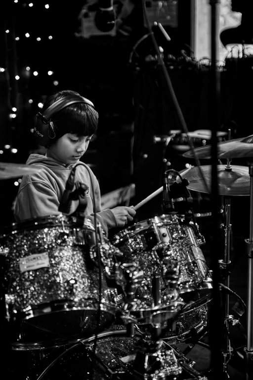 Detail shot of drums and cymbals during a live performance