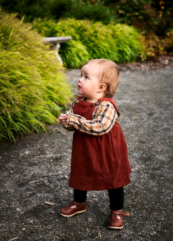 Baby exploring the world with curious wide eyes