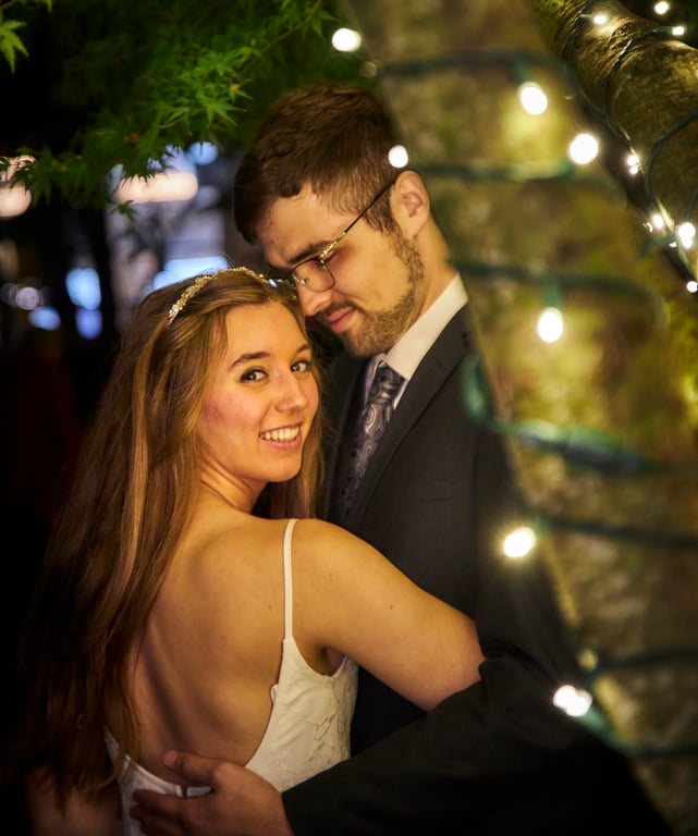 Heartfelt candid wedding moment captured between the newlyweds