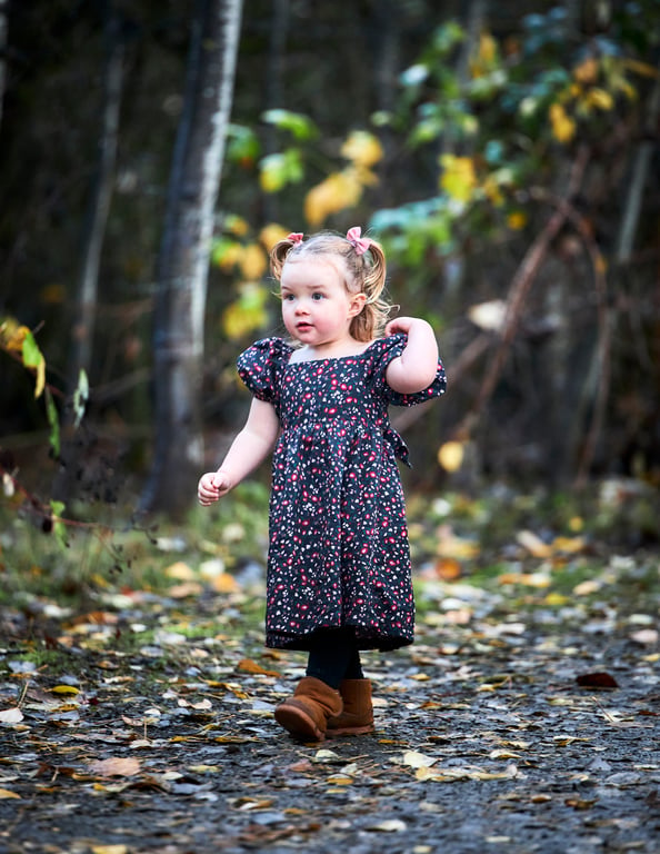 Baby reaching out with tiny curious fingers