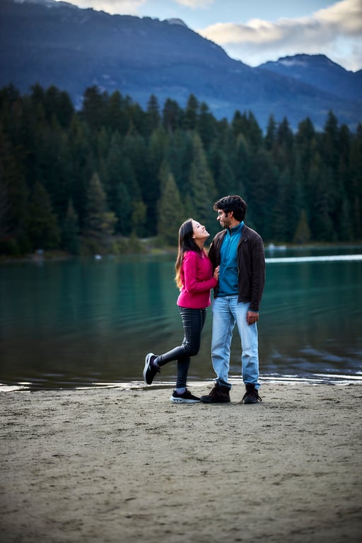 Outdoor couples embrace framed by lush Pacific Northwest greenery