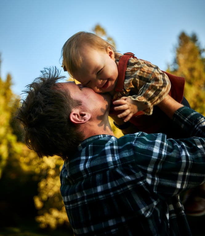 Family posed together in a scenic outdoor Pacific Northwest spot