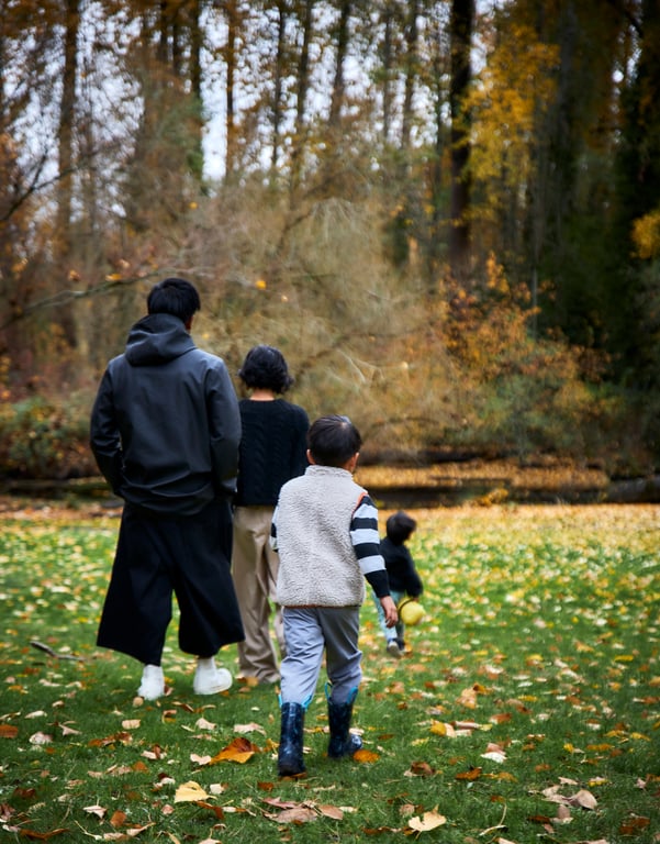 Children interacting with playful energy during a family shoot