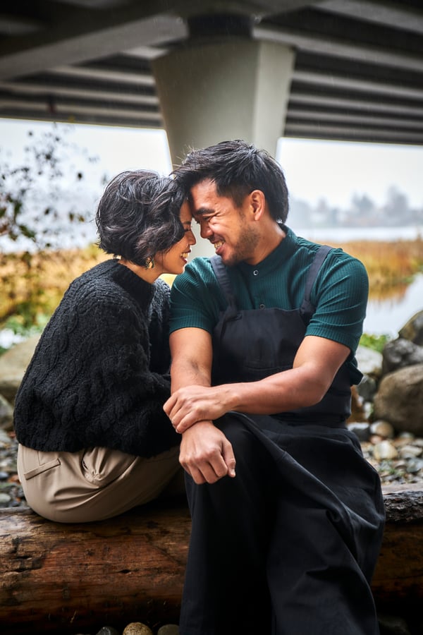 Couple sharing a tender outdoor moment during a Pacific Northwest photo session