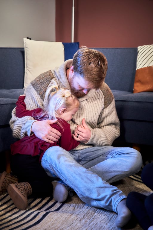 Family sharing a heartfelt moment together as a group