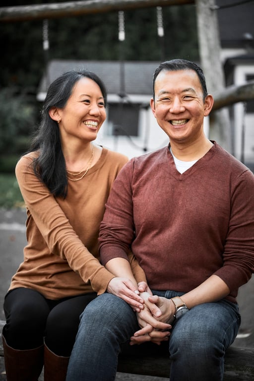 Couple embracing in soft diffused afternoon light