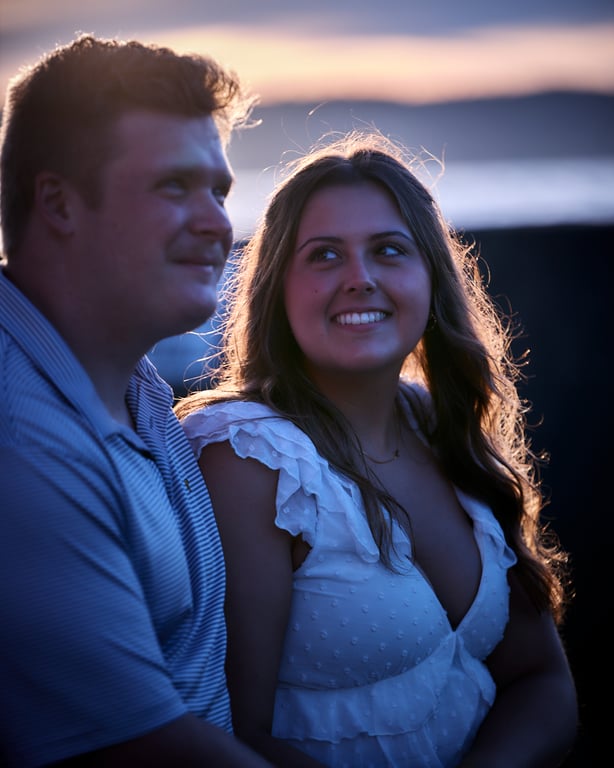 Couple looking at each other with warm genuine smiles