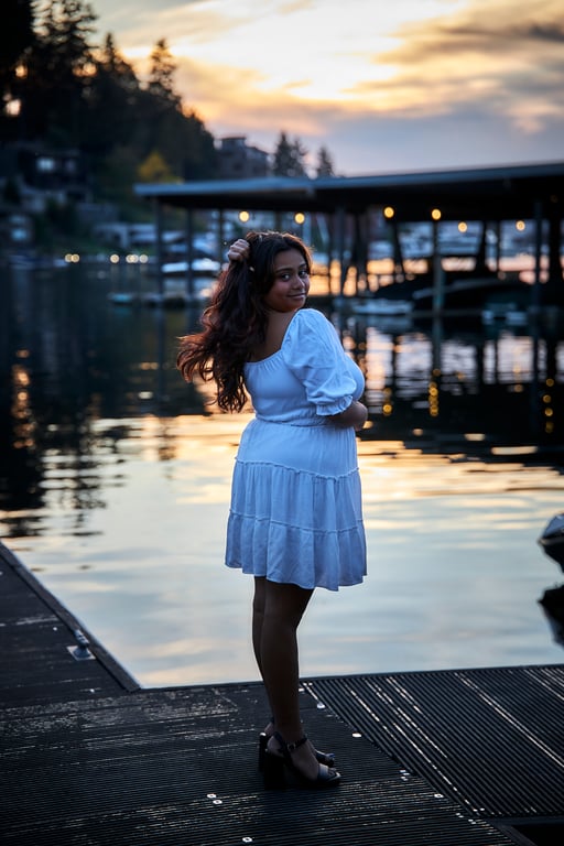 Environmental portrait set against a scenic Pacific Northwest backdrop