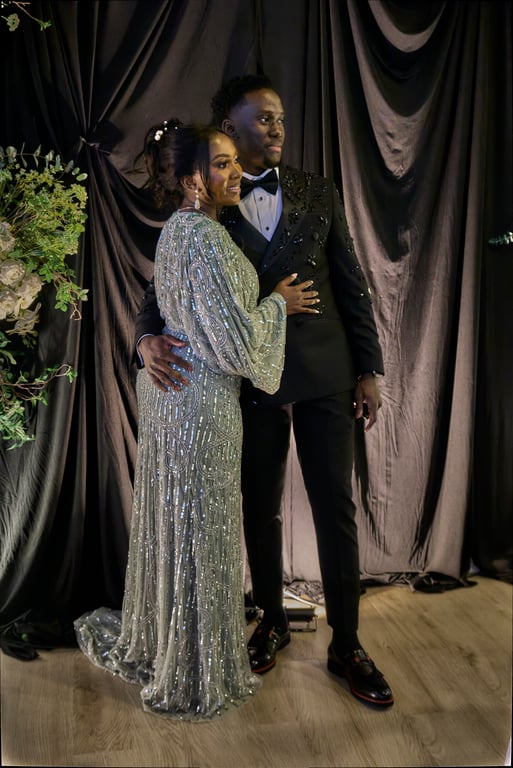 Couple laughing together in a candid wedding moment
