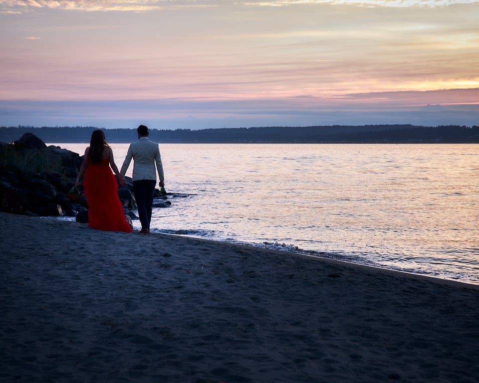 Couple gazing at each other with genuine warmth in natural light