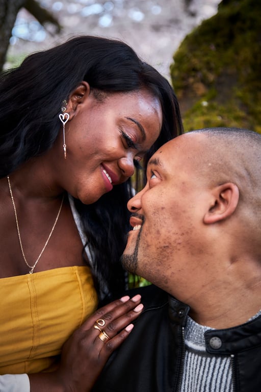 Loving expressions shared between a couple in gentle natural light