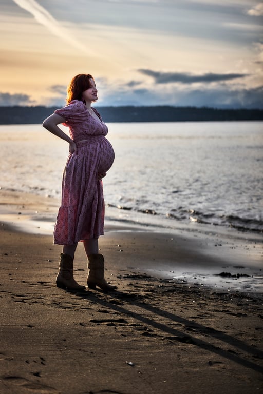 Expectant couple during a maternity session in soft afternoon light