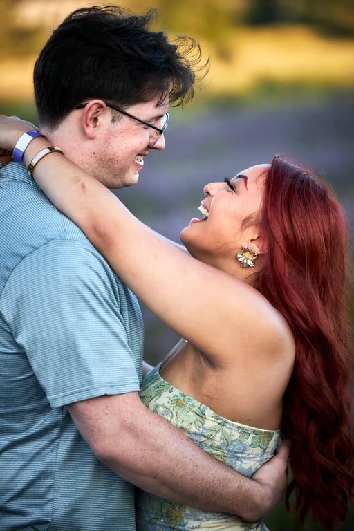 Couple laughing together during a relaxed photo session