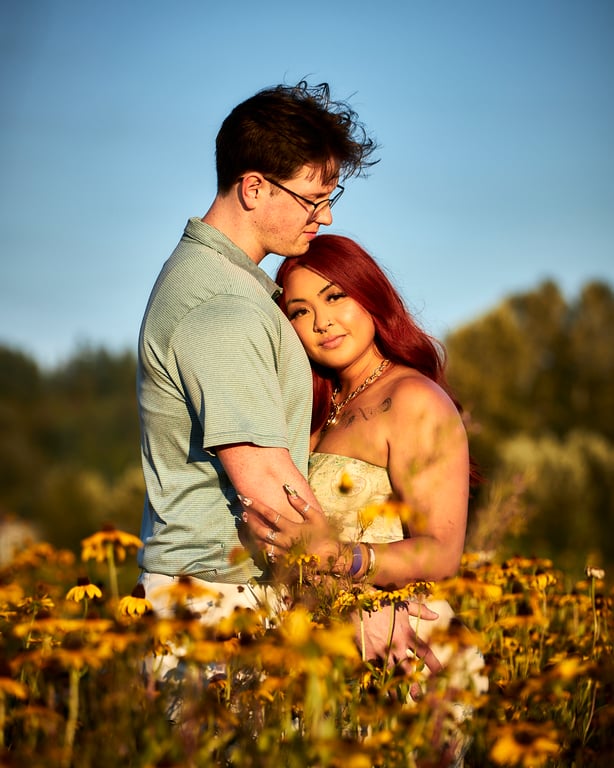 Couple looking at each other with quiet affection in soft light