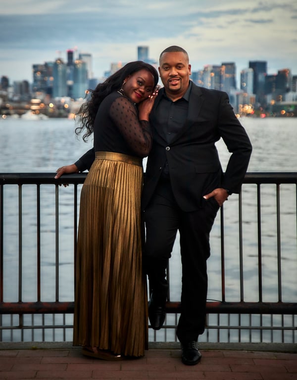 Couple smiling together during a relaxed outdoor portrait session