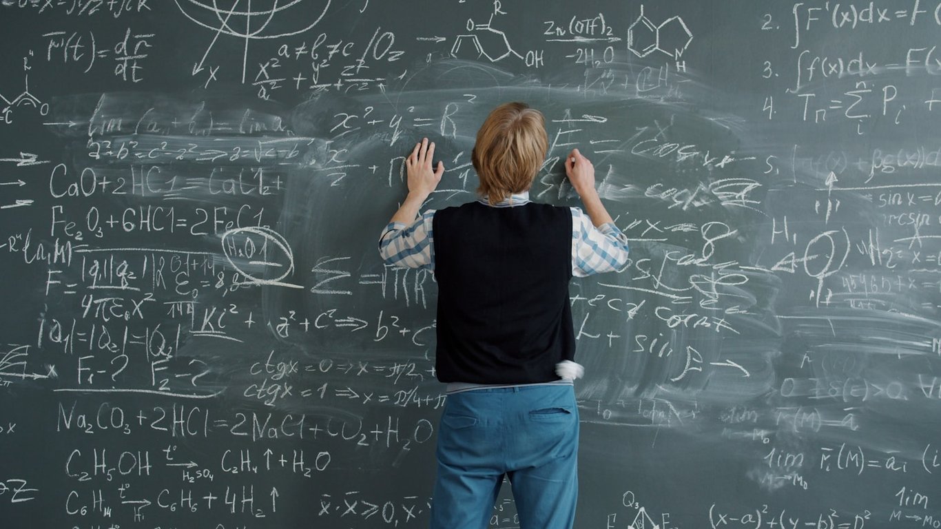 Student working through algebra problems