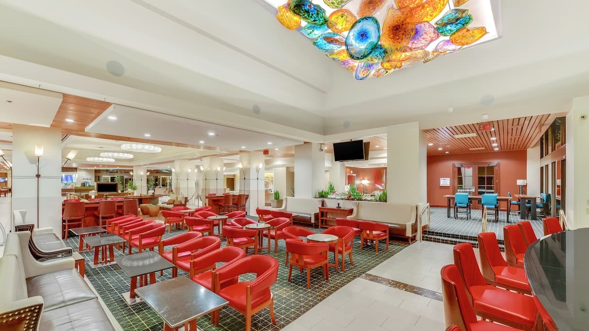 Red Chairs | Hotel Fera Anaheim, a DoubleTree by Hilton Hotel