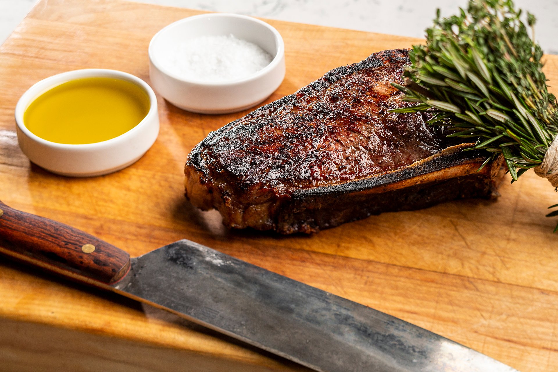 Dry Aged Bone-In New York Steak.jpg | Conrad Las Vegas at Resorts World
