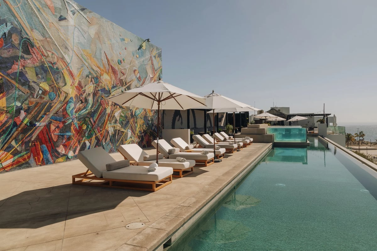 https://imagedelivery.net/jHDmI3UpXy0vHMoFeeZZfg/elganzo-amenities-rooftop-1/