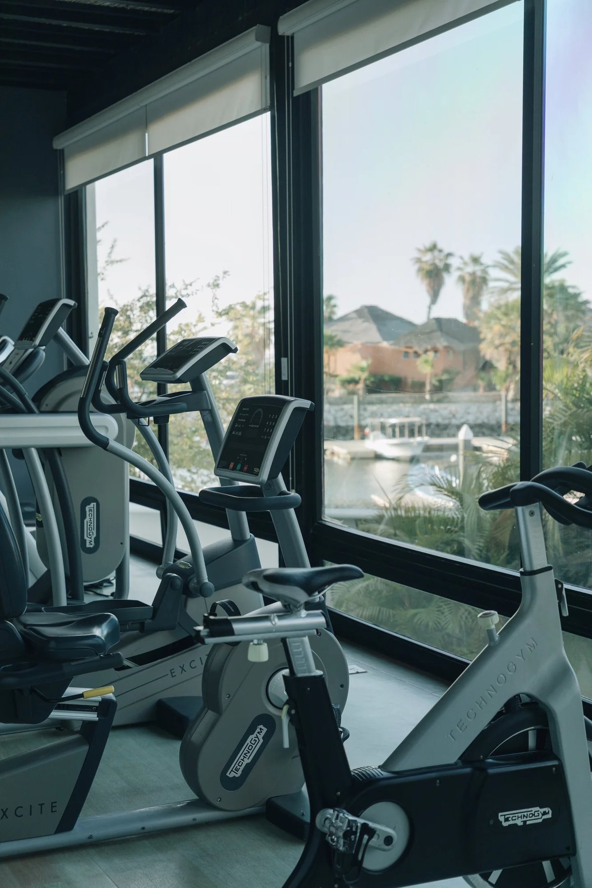 https://imagedelivery.net/jHDmI3UpXy0vHMoFeeZZfg/elganzo-amenity-wellness-movement-24-7-gym-hero-image/