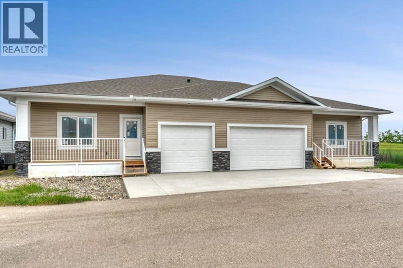 160 Ridgestone Lane, Diamond Valley, Alberta, T0L2A0, Diamond Valley, Alberta — photo 1 of 5