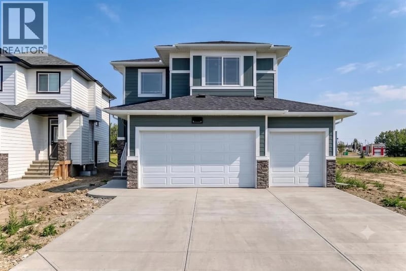 707 Mandalay Avenue, Carstairs, Alberta, T0M0N0, Carstairs, Alberta — photo 1 of 5