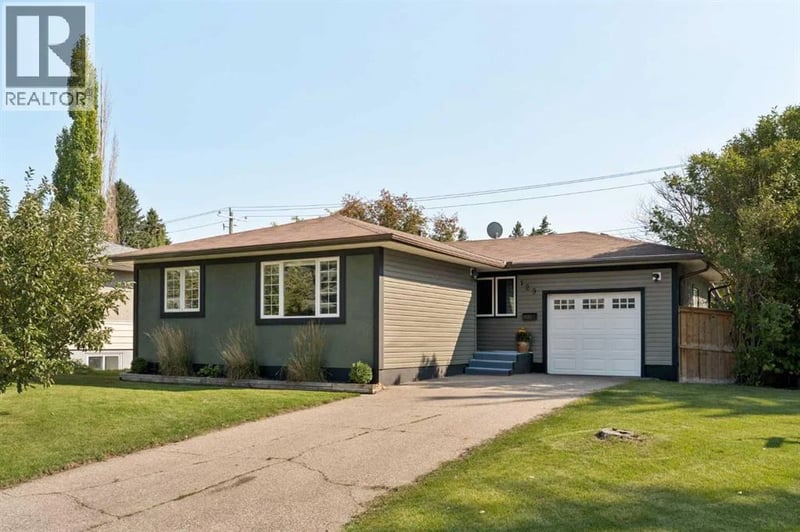 129 Springwood Drive Southwest, Calgary, Alberta, T2W0K8, Calgary, Alberta — photo 1 of 5