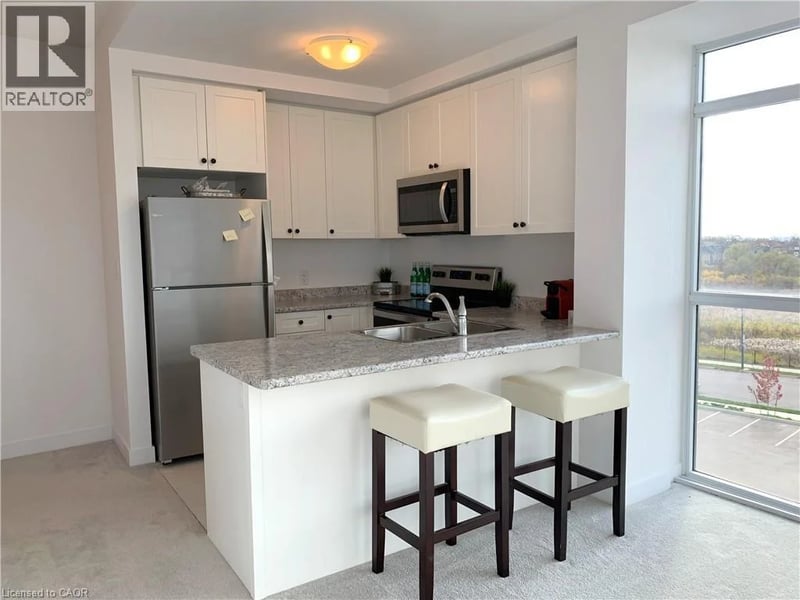 #402 450 DUNDAS Street East, Waterdown, Ontario, L8B1Z2, Waterdown, Ontario — photo 1 of 5