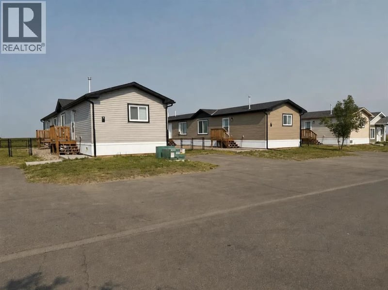 61014 Meadows Crescent, Taber, Alberta, T1G0G7, Taber, Alberta — photo 1 of 5