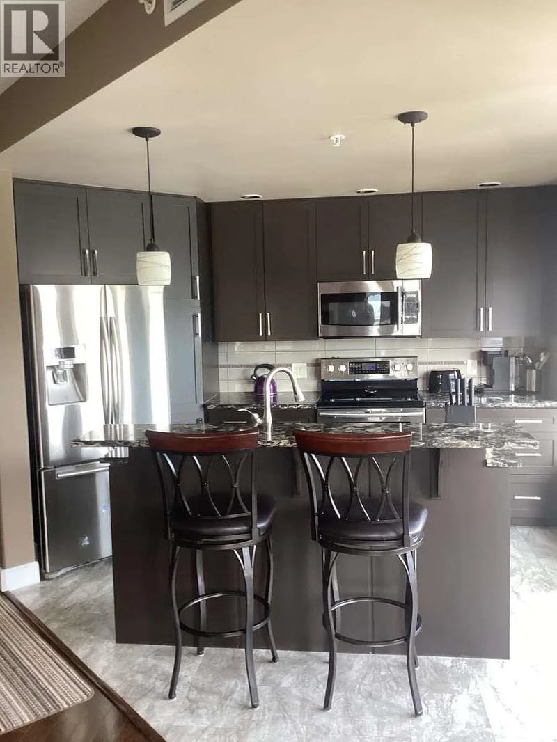 #801 1947 Underhill Street, Kelowna, British Columbia, V1X7Z5, Kelowna, British Columbia — photo 1 of 5