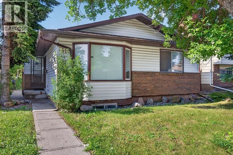 319 Rundlelawn Road Northeast, Calgary, Alberta, T1Y3P2, Calgary, Alberta — photo 1 of 5