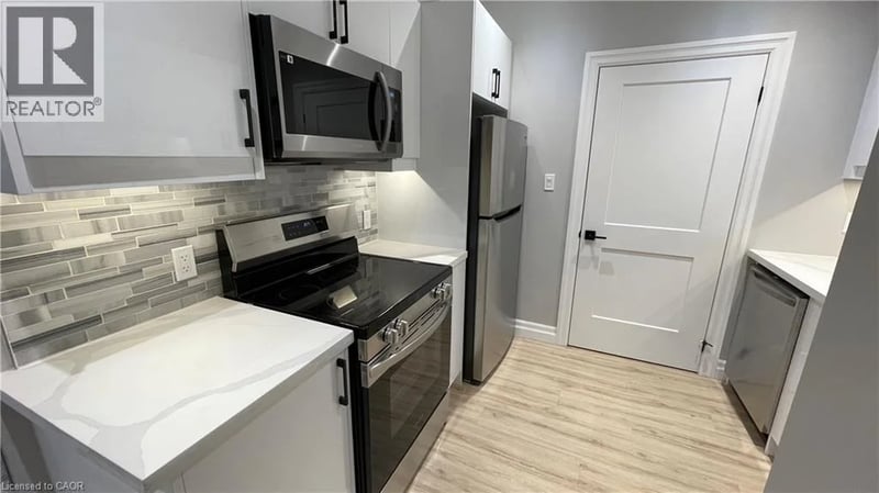 #102 69 EAST MAIN Street, Welland, Ontario, L3B3W4, Welland, Ontario — photo 1 of 5