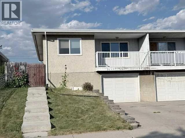 31 Huntford Road Northeast, Calgary, Alberta, T2K3Y8, Calgary, Alberta — photo 1 of 5