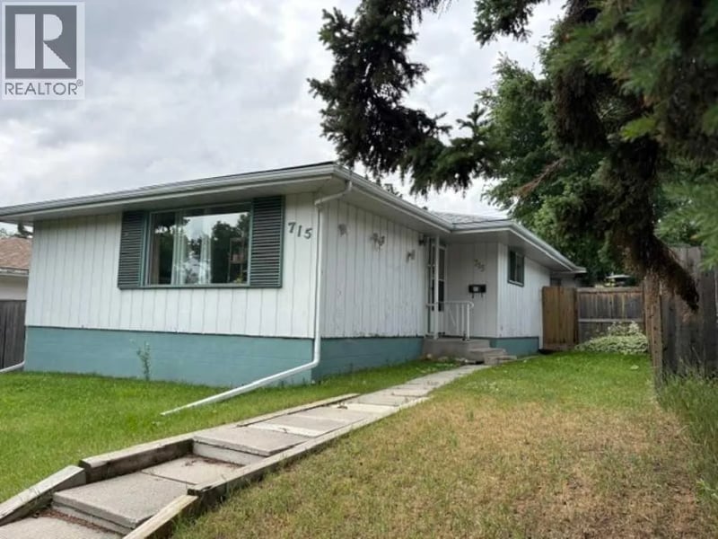 715 64 Avenue Northwest, Calgary, Alberta, T2K0M3, Calgary, Alberta — photo 1 of 5