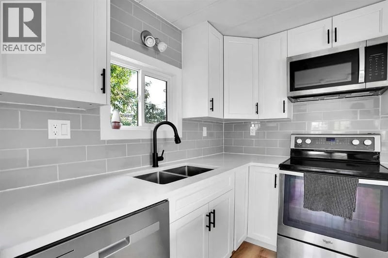 64 Huntwell Way Northeast, Calgary, Alberta, T2k5t2, Calgary, Alberta — photo 1 of 5