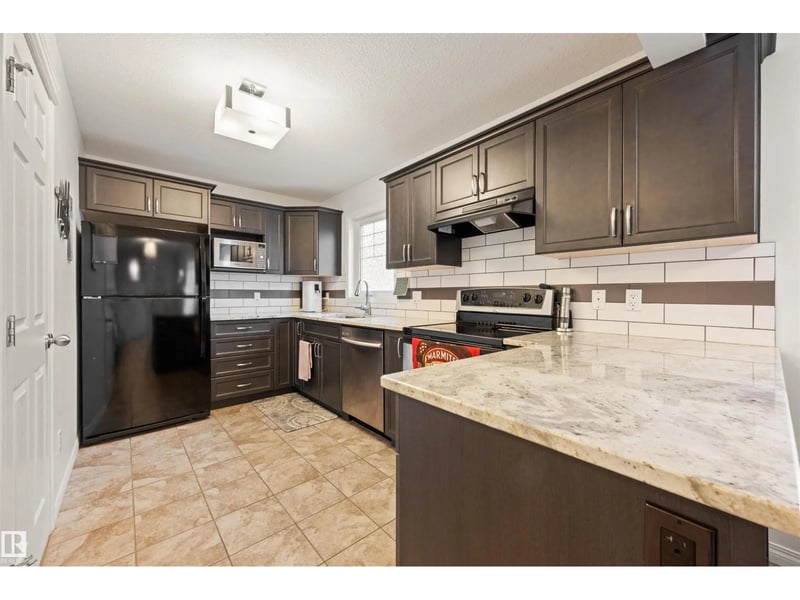 12425 111 AV NW, Edmonton, Alberta, T5M0M2, Edmonton, Alberta — photo 1 of 5