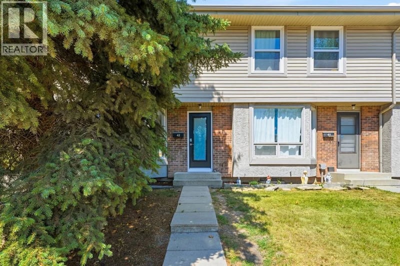 123 Queensland Drive Southeast, Calgary, Alberta, T2J5J4, Calgary, Alberta — photo 1 of 5